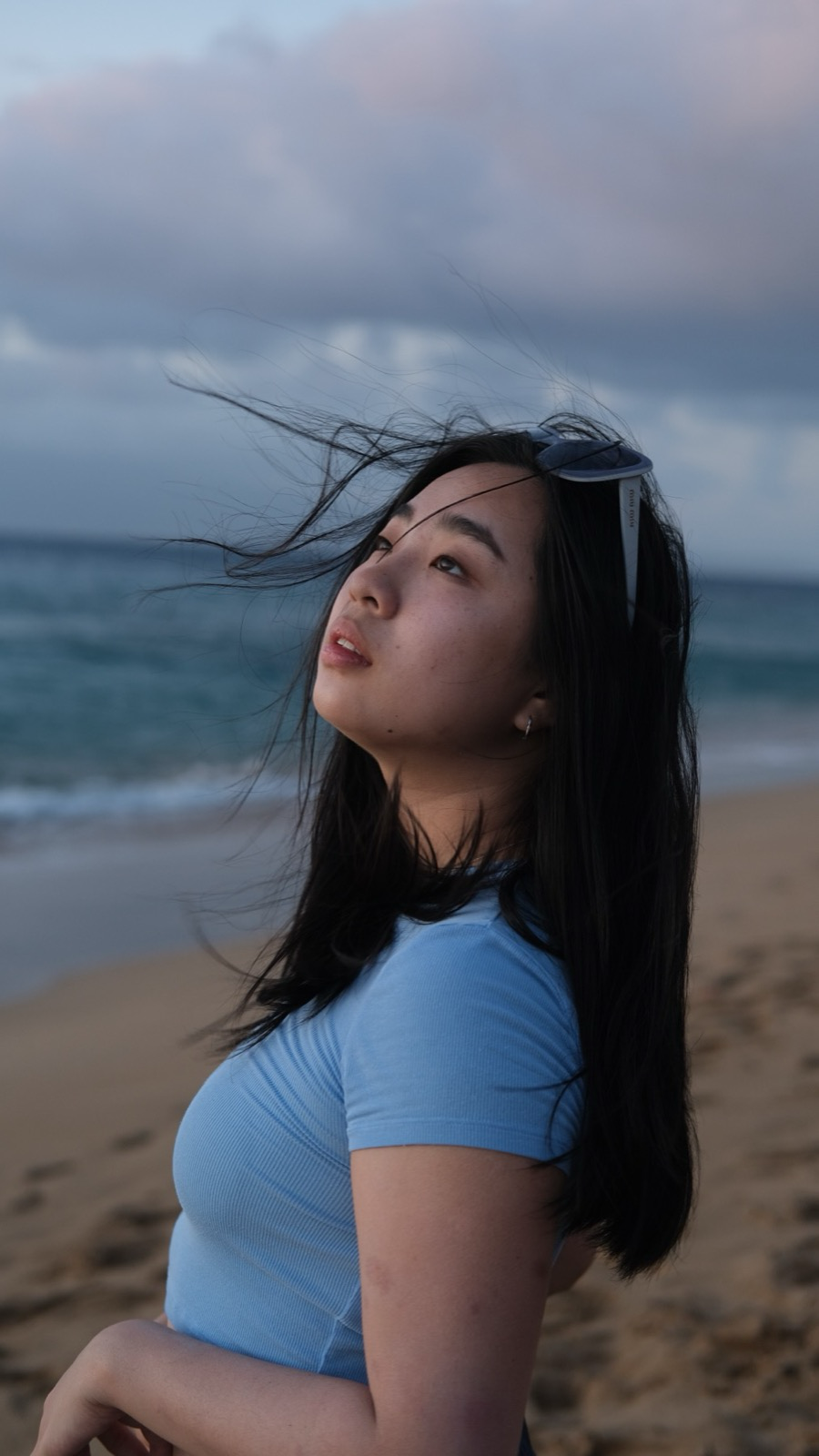 Portrait of Winnie Ma by the ocean at dusk